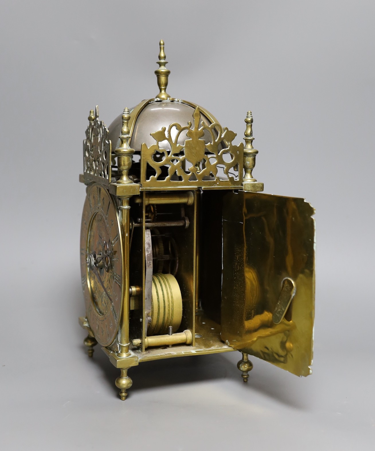 A brass lantern clock, signed Robert Drew, London, single fusee movement, 34 cms high
